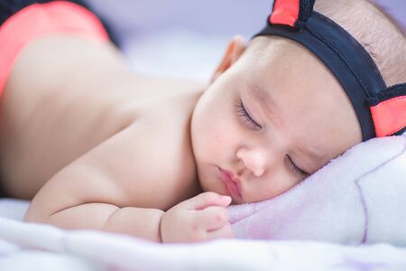 bright portrait of adorable babyの写真素材