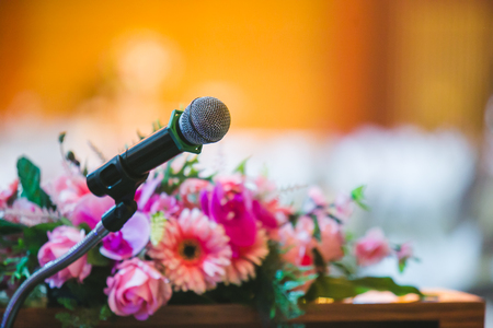 Close up of microphone in concert hall or conference roomの写真素材