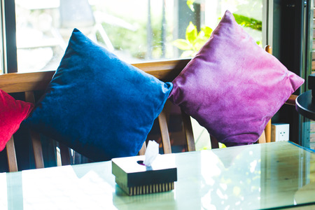 Interior design,cushions and lamp on end table