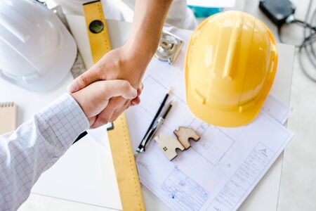 Engineer and Architect concept, Engineer Architects office team working with blueprintsの写真素材