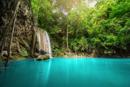 Waterfall in forest at Erawan National Park, Thailandの写真素材