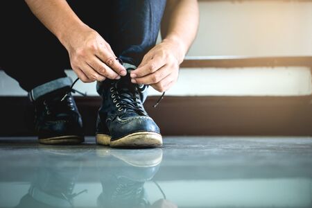 Men wearing work black boot.の写真素材