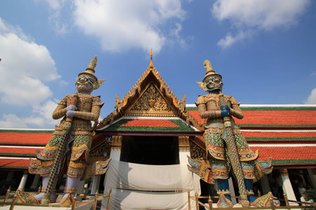 The big giant,beuautiful building and white cloud blue sky in wat phra keaw,Bangkok Thailandの写真素材