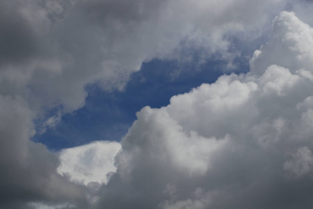 The clouds in the blue sky