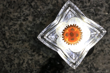 Top view of Thai dessert on small white glass cup on grey ground