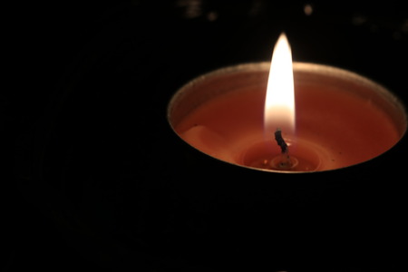 Small  candlelight on black groundの写真素材