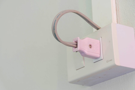 The power plug is attached to the wall.