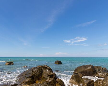 sea water impact the rocksの写真素材