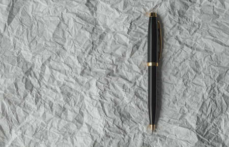 Pen on paper crumpledの写真素材