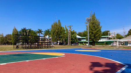 Outdoor basketball court in the park at sunny day, Thailand.の写真素材