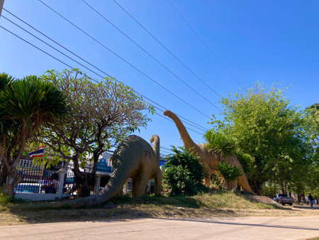 Statues of dinosaurs on the streets of the cityの写真素材
