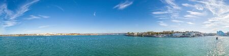 Seaside promenade Sevastopol from a ship. Panorama of the waterfront of Sevastopol. View of the embankment of Sevastopol. Copy space.の写真素材