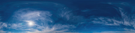 Blue sky panorama with Cirrus clouds. Seamless hdr 360 degree pano in spherical equirectangular format. Complete zenith for 3D visualization, game and sky replacement for aerial drone 360 panoramas.の写真素材