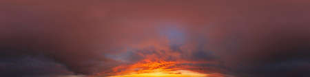Red burning sunset sky panorama with Cumulus clouds. Seamless hdr 360 pano in spherical equirectangular format. Complete zenith for 3D visualization, game, sky replacement for aerial drone panoramasの写真素材