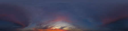 Panorama of a dark blue sunset sky with pink Cumulus clouds. Seamless hdr 360 panorama in spherical...