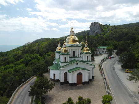 Christian church in the mountains above the sea. Temple of the Holy Archangel Michael in Oreanda....