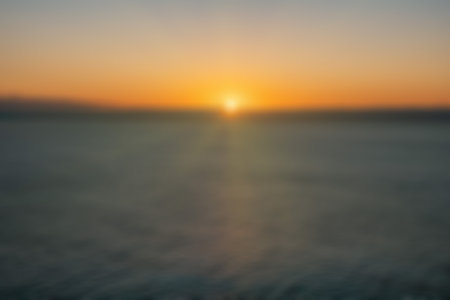 Abstract defocused blured background Abstract Aerial panoramic view on warm sunset over sea. Nothing...