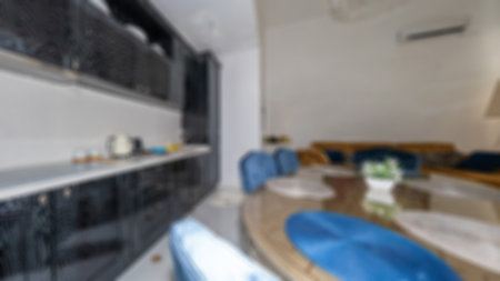 Defocused and Blur Photo of Luxury and Modern Kitchen Dining Room with Pantry Interior Design.