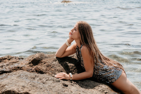 Woman summer travel sea. Happy tourist enjoy taking picture outdoors for memories. Woman traveler...