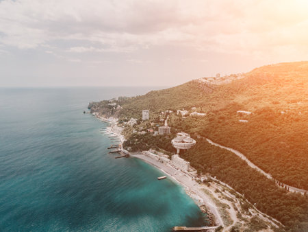Christian church in the mountains above the sea. Temple of the Holy Archangel Michael in Oreanda. The southern coast of Crimea. Aerial viewの写真素材