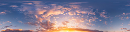 Sunset sky panorama with bright glowing pink Cumulus clouds. HDR 360 seamless spherical panorama....