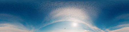 Sunset sky panorama with bright glowing pink Cirrus clouds. HDR 360 seamless spherical panorama....