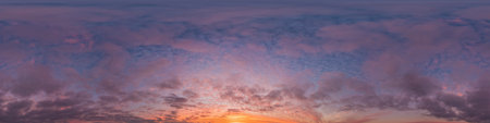 Sunset sky panorama with bright glowing pink Cumulus clouds. HDR 360 seamless spherical panorama. Full zenith or sky dome in 3D, sky replacement for aerial drone panoramas. Climate and weather change.の写真素材