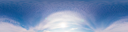 Sunset sky panorama with bright glowing pink Cirrus clouds. HDR 360 seamless spherical panorama....