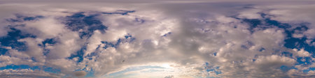 Sunset sky panorama with bright glowing pink Cumulus clouds. HDR 360 seamless spherical panorama....