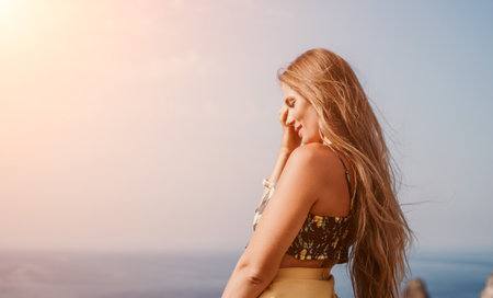 Woman travel sea. Happy tourist taking picture outdoors for memories. Woman traveler looks at the...