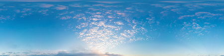 360 panorama of glowing sunset sky with bright Cirrus clouds. Seamless hdr spherical 360 panorama. Sky dome in 3D visualization, sky replacement for aerial drone panoramas. Weather and climate change.の写真素材