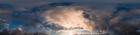 Sunset sky panorama with bright glowing pink Cumulus clouds. HDR 360 seamless spherical panorama....