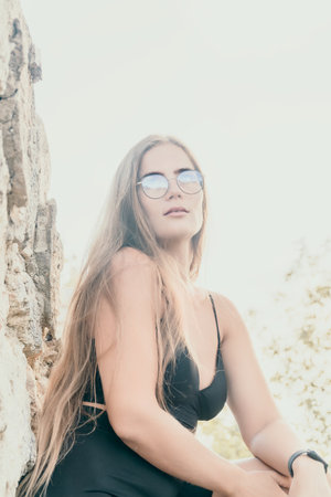Woman summer travel. Happy tourist enjoy taking selfie photo outdoors for memories. Woman traveler...