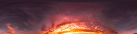 Seamless 360 HDR spherical panorama of sunset sky with vibrant pink Cirrus clouds. Full zenith or...