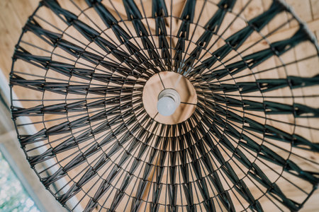 Wicker Lamp Shade with a Light Bulb