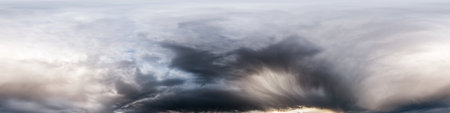 Dark moody rain clouds in dramatic overcast sky. Seamless 360 HDR spherical panorama. Full zenith or...