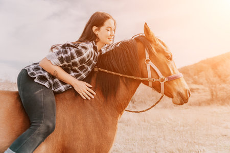 Young Woman Riding a Horse at Sunset