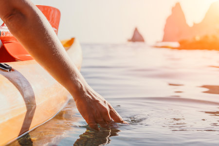 Kayaking Water Hand Touching Calm Seaの写真素材