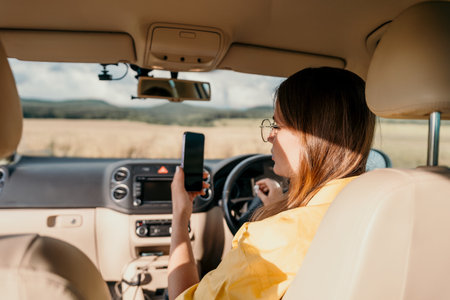 Woman Using Her Phone While Driving