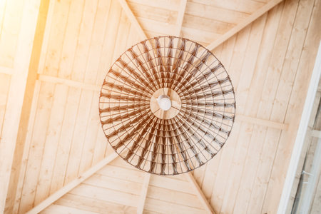 Modern Ceiling Light in a Wooden Roomの写真素材