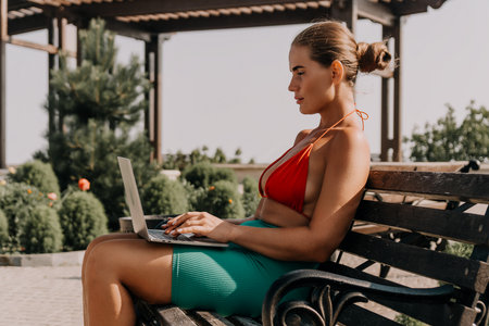 Woman Laptop Bench Working Outdoors Summerの写真素材