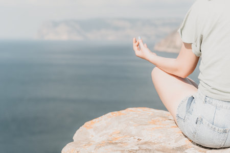 Peaceful Meditation on a Clifftopの写真素材