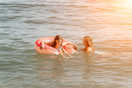 Two Girls Enjoying a Summer Day at the Beach