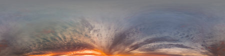 Seamless 360 HDR spherical panorama of sunset sky with vibrant pink Cumulus clouds. Full zenith or...