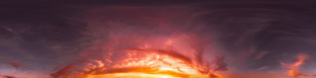 Seamless 360 HDR spherical panorama of dark sunset sky with glowing vibrant pink Cirrus clouds. Full zenith or sky dome in 3D, sky replacement for aerial drone panoramas. Climate and weather change.の写真素材