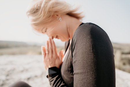 Woman Meditating in Natureの写真素材