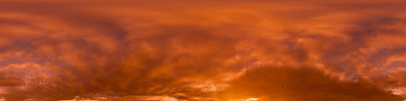 Sunset sky with bright glowing pink Cumulus clouds. Seamless spherical HDR 360 panorama. Full zenith...