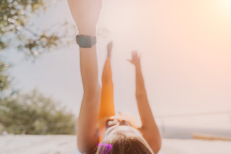 Woman Stretching On The Beachの写真素材