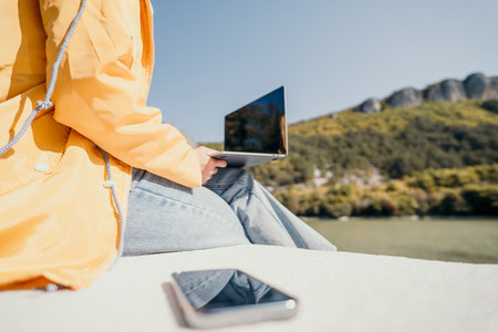 A Relaxed Moment of Work and Natureの写真素材