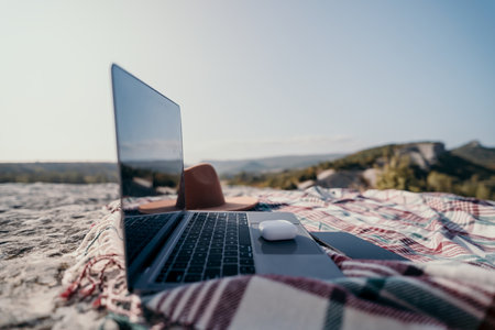 Laptop on a Blanket in Natureの写真素材